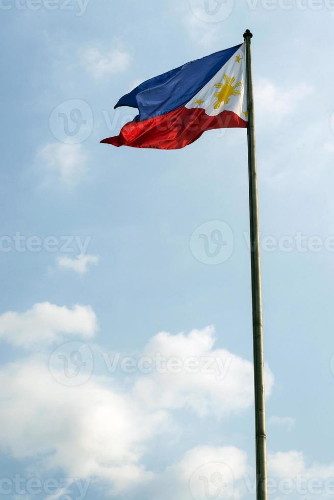 Philippines Filipino flag flying on flagpole in Manila photo