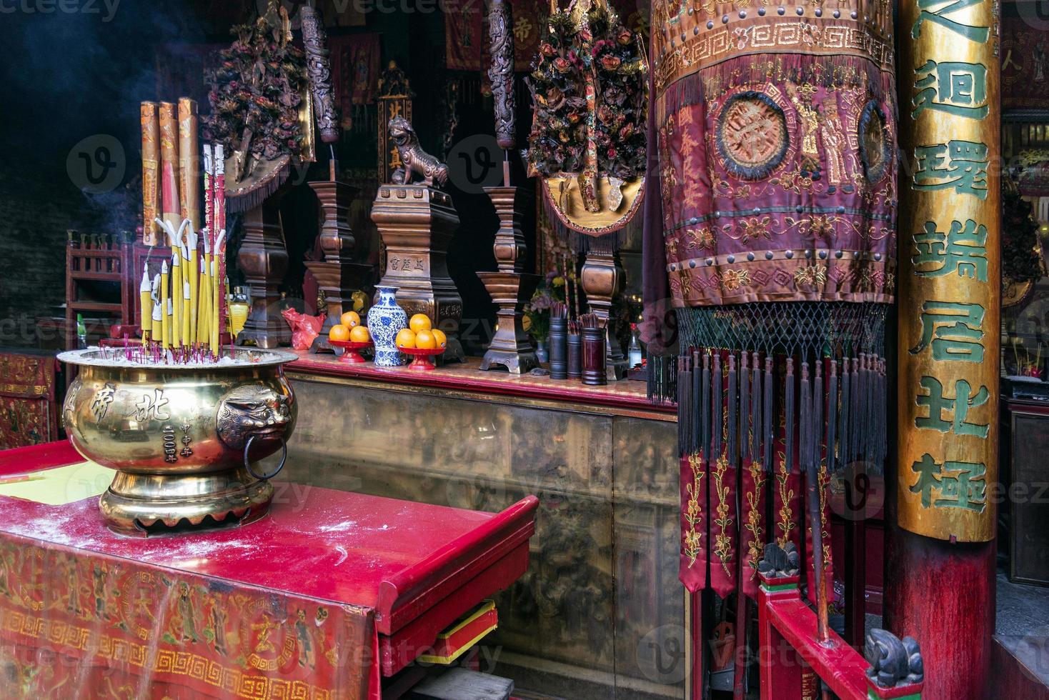 Shrine altar detail inside famous Chinese A-Ma temple in Macau China photo