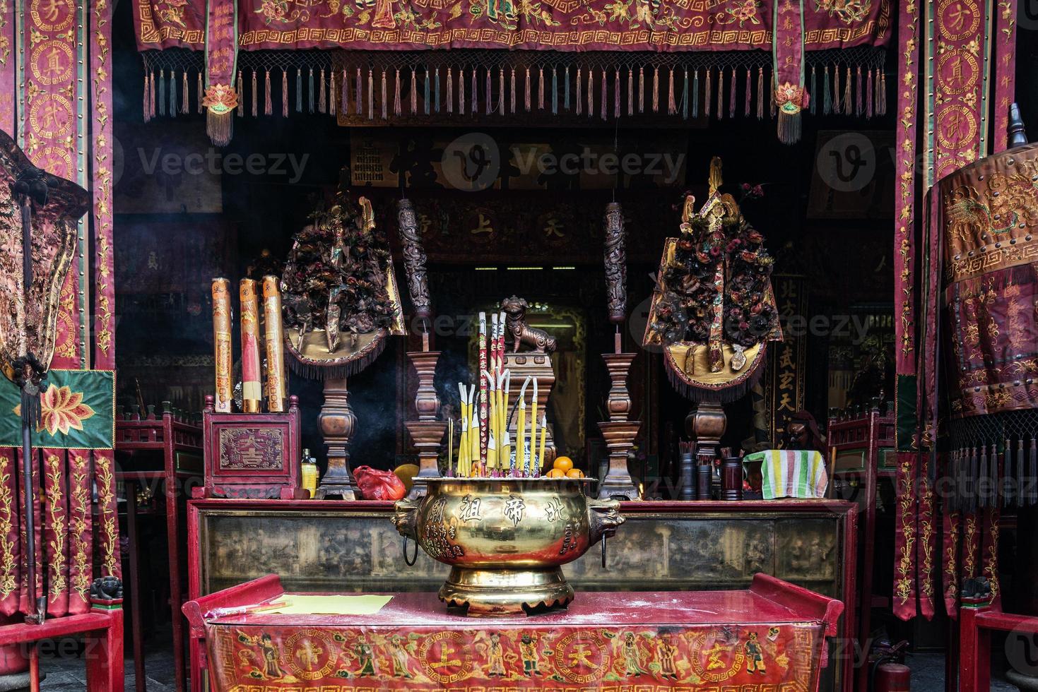 Shrine altar detail inside famous Chinese A-Ma temple in Macau China photo