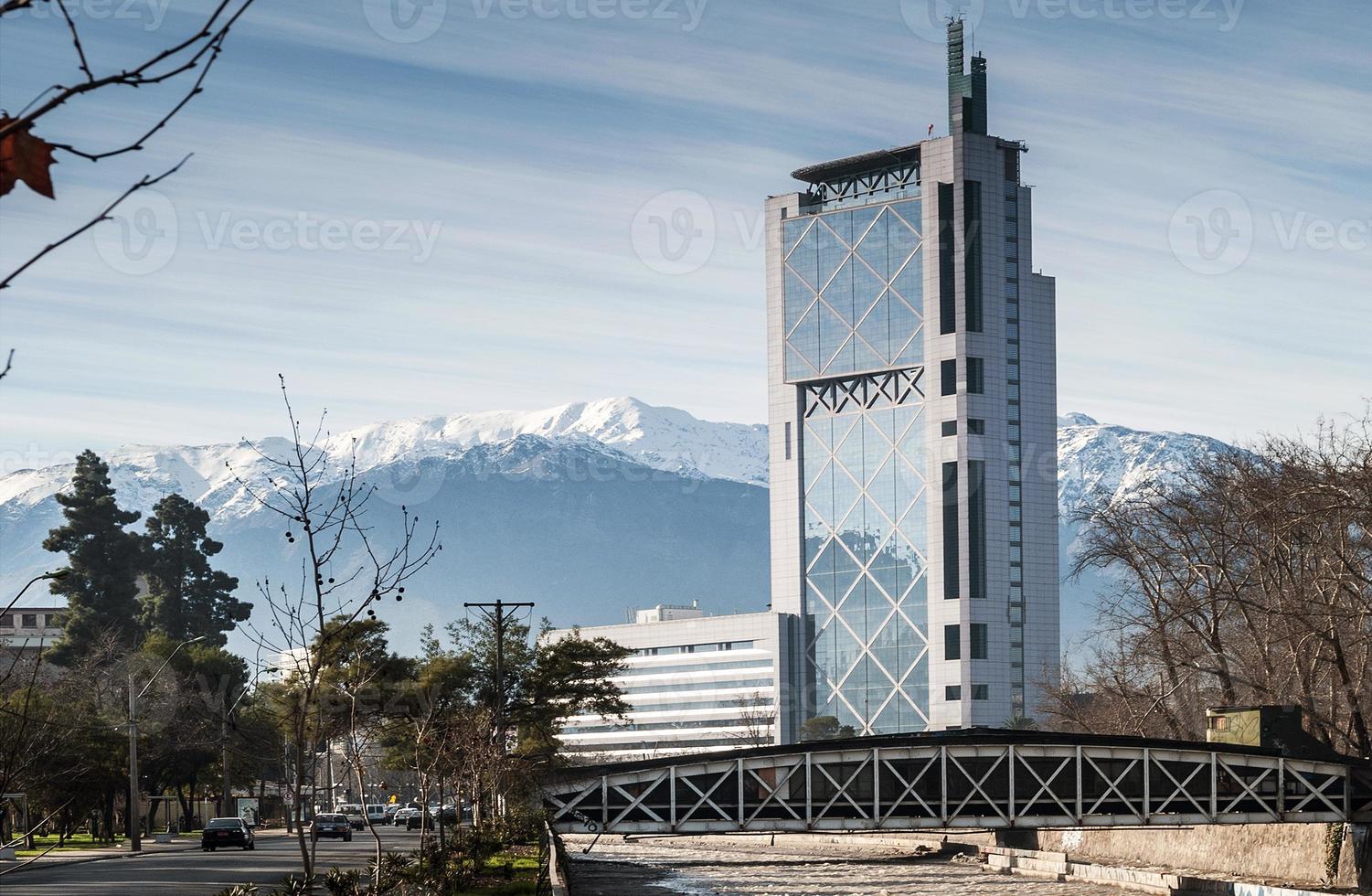 Downtown street in Santiago de Chile city and Andes mountains view photo