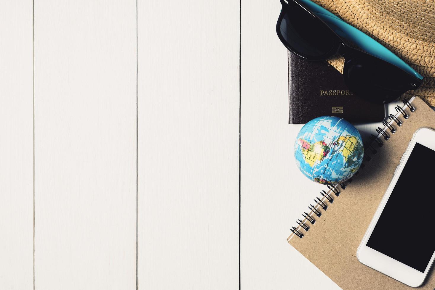 Top view of important travel items with copy space. photo