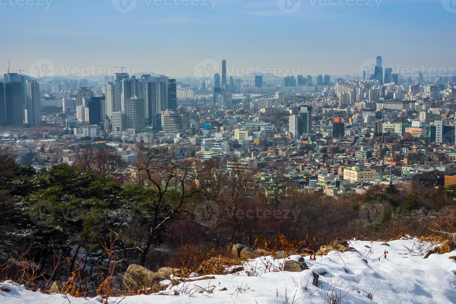 Downtown South Korea skyline on a blue sky background. photo