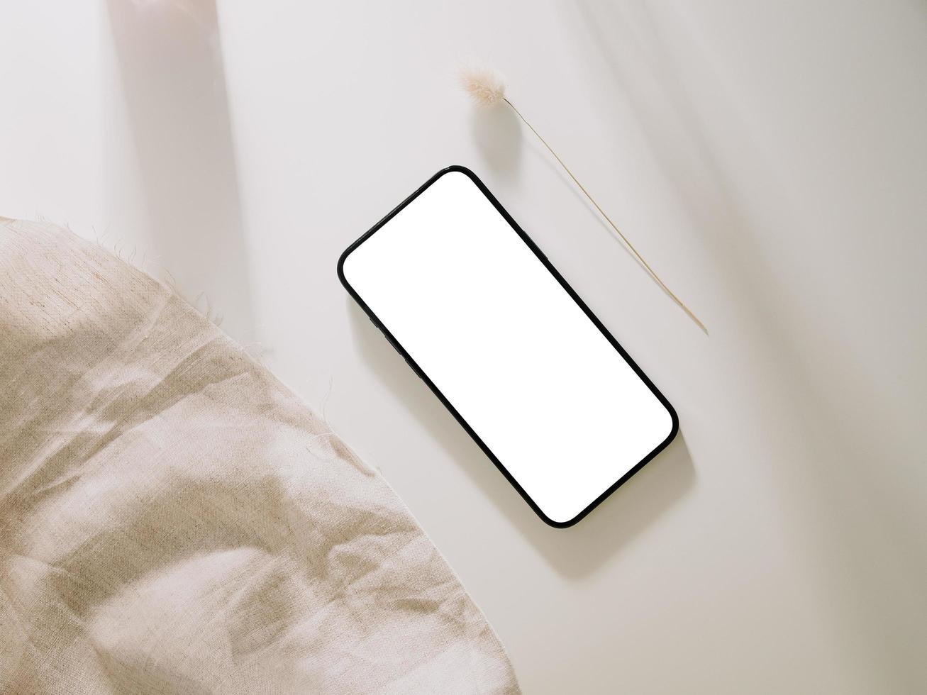 Smartphone mockup with phone with blank screen template, flat lay photo