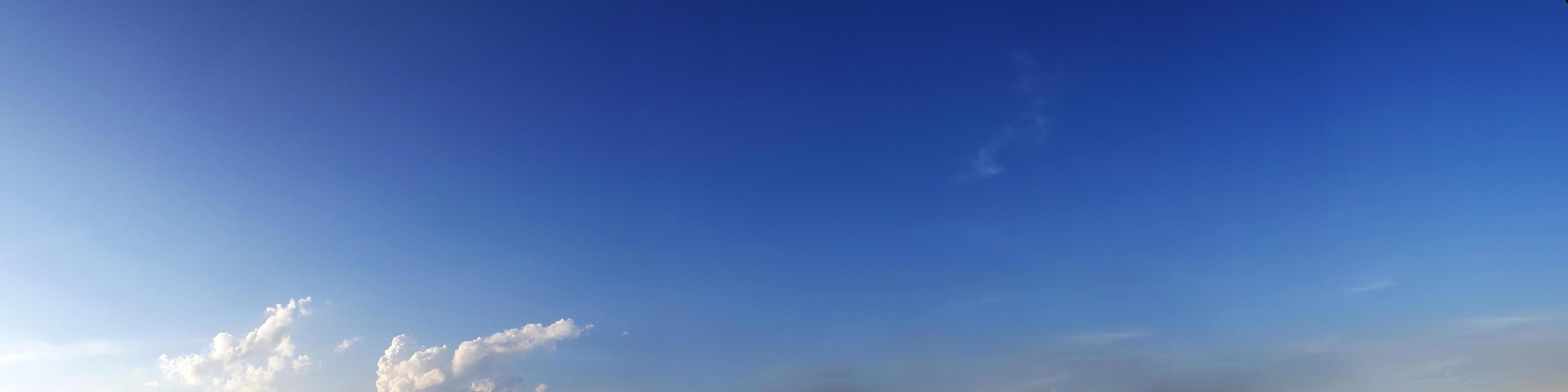 Vibrant color panoramic sky with cloud on a sunny day. photo