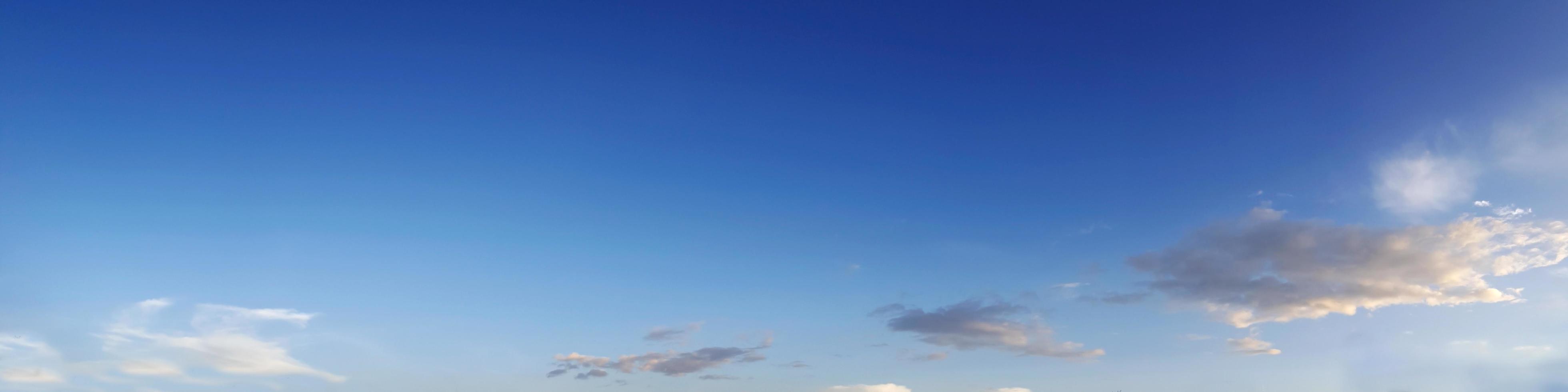 Vibrant color panoramic sky with cloud on a sunny day. photo