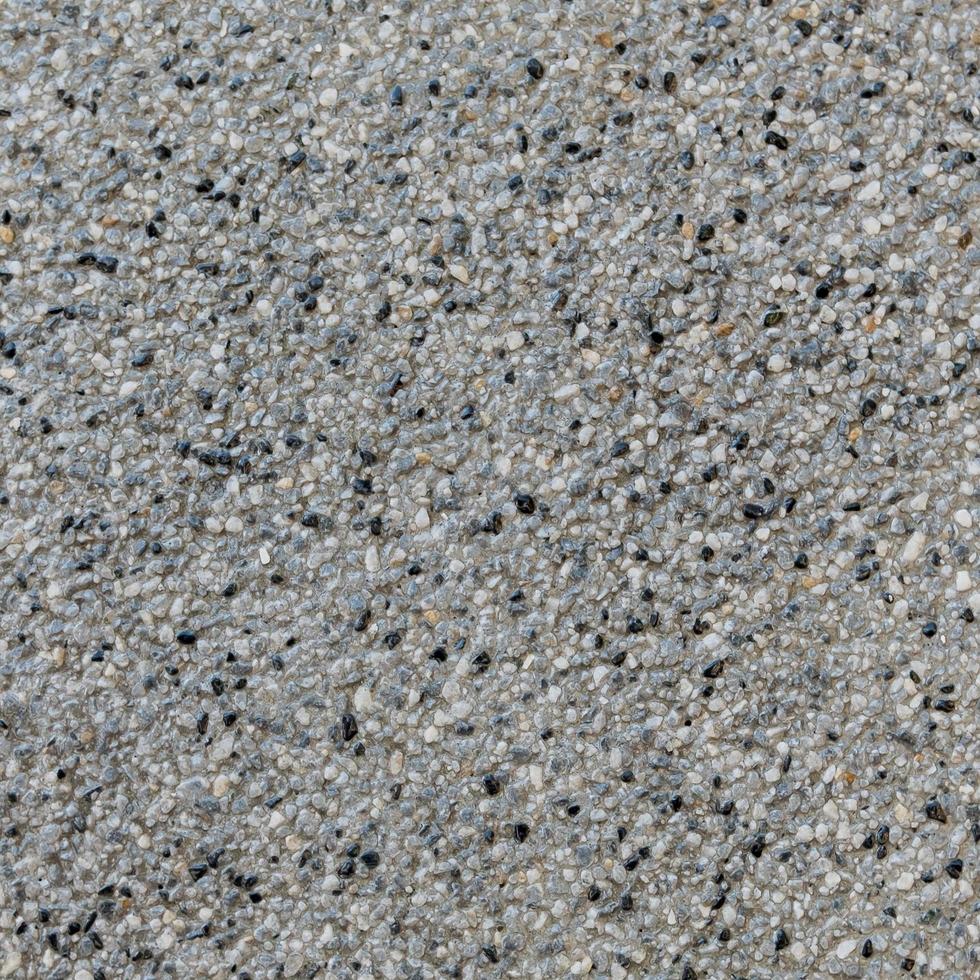Fondo de textura de piso lavado de arena. foto