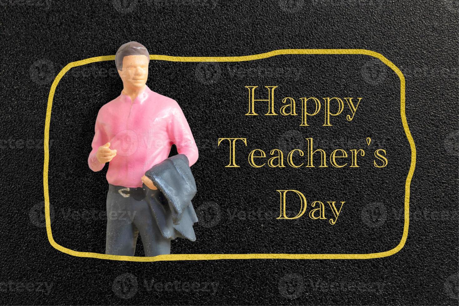 Miniature people Teacher in front of blackboard photo