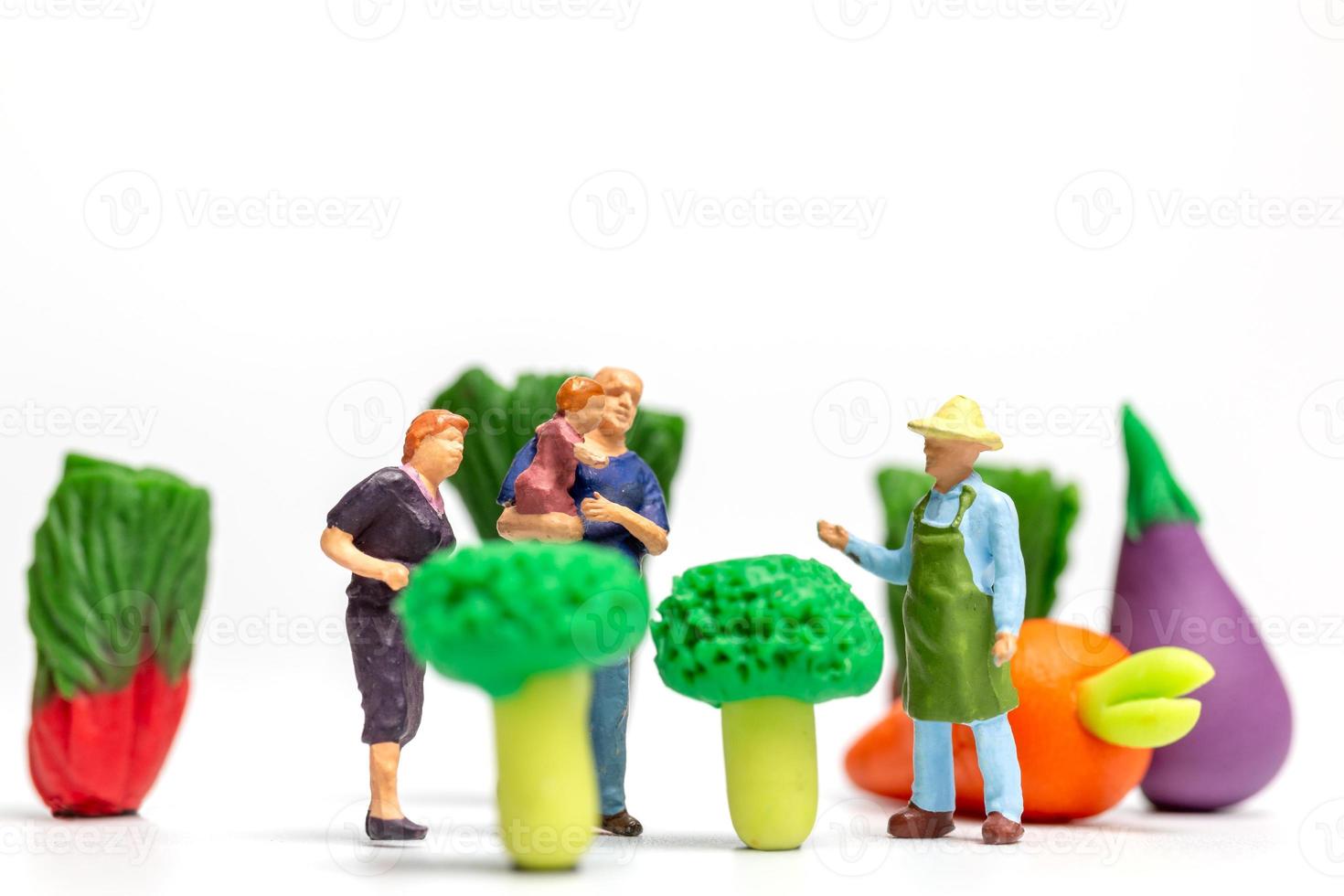 Happy family resting in vegetable farm. World Vegetarian Day concept photo