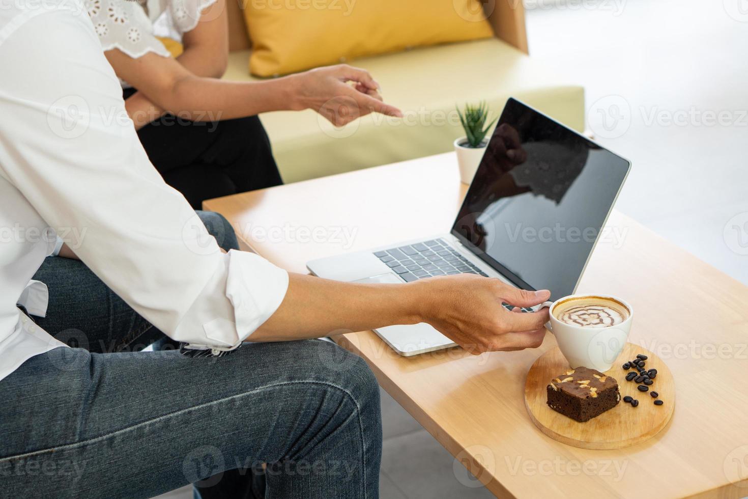 Young businessman working on computer photo