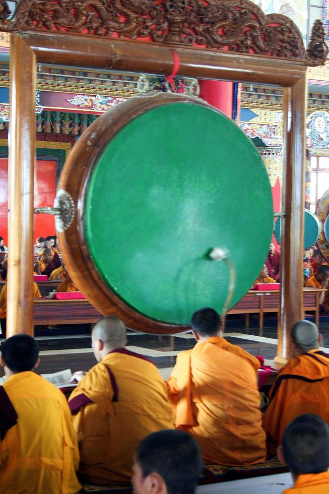 Offering Prayer at Golden Temple, Bailukuppe, near Kushalnagar, Mysore District, Karnataka, India, Asia photo