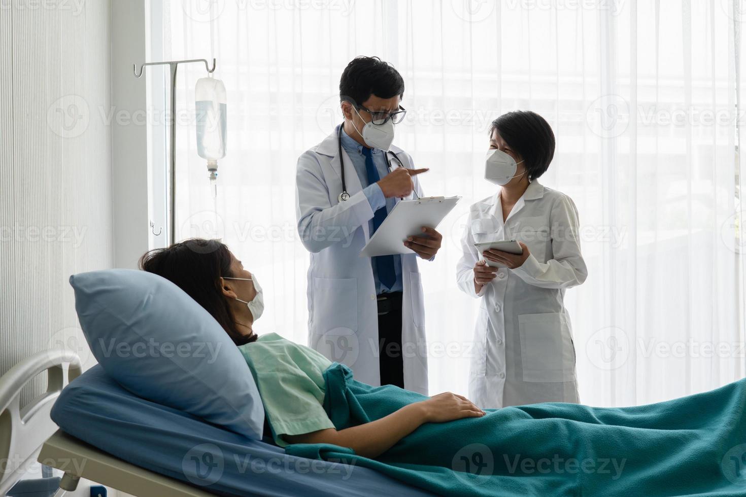 Doctors discussing patient's care photo