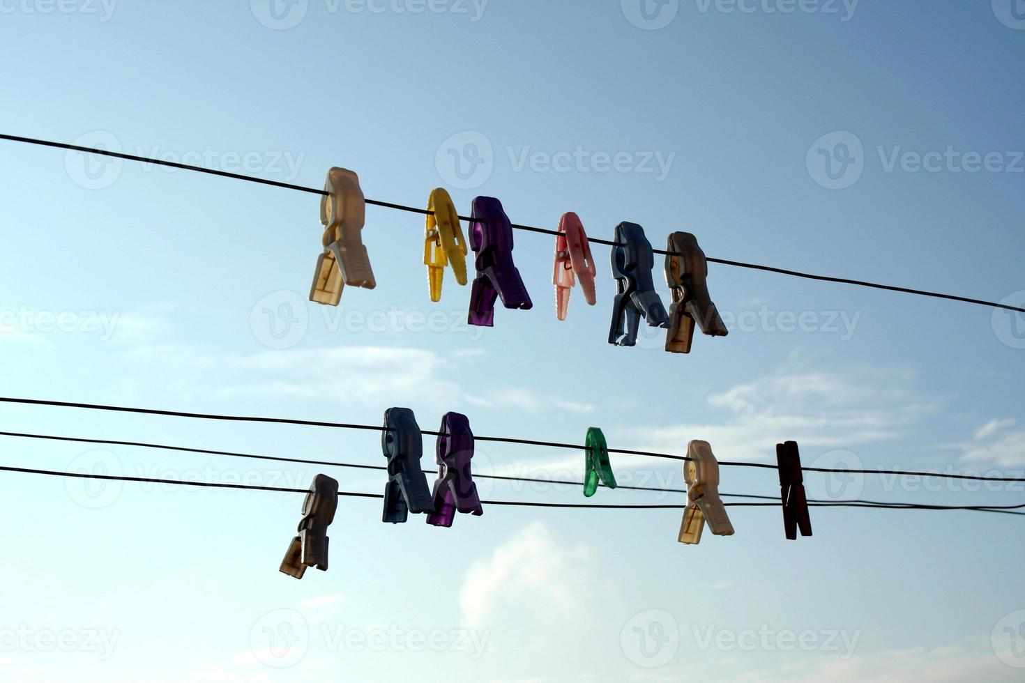 Cloth clips on drying lines photo