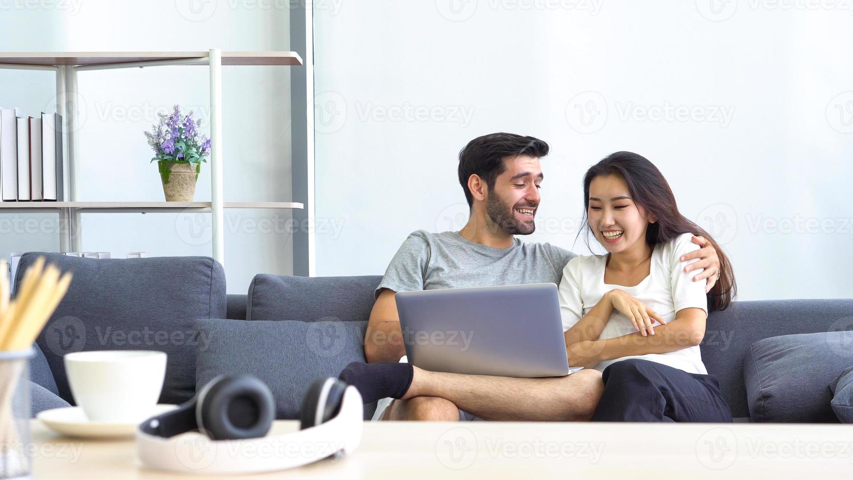 Couple using a laptop photo