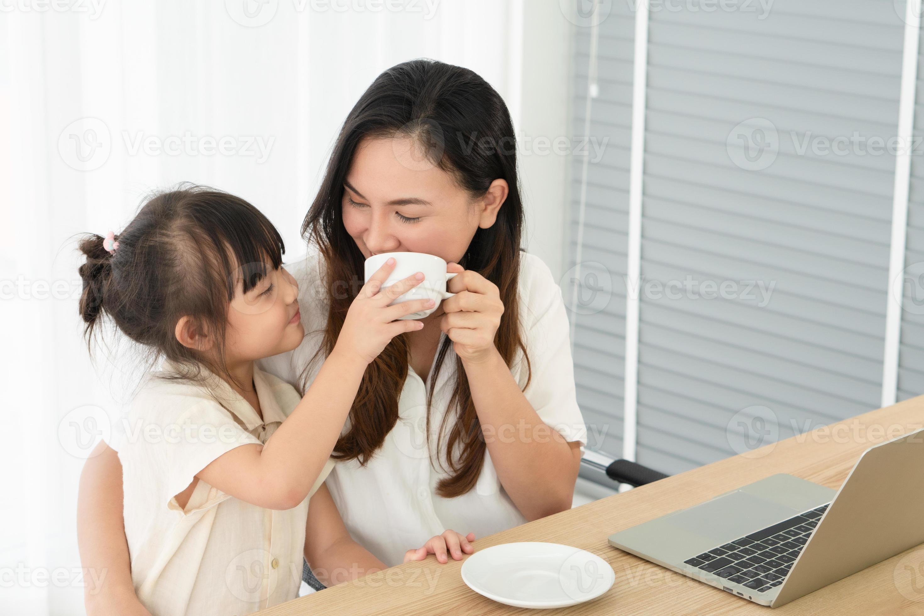 Mother and child drinking tea at home together 3314168 Stock Photo at