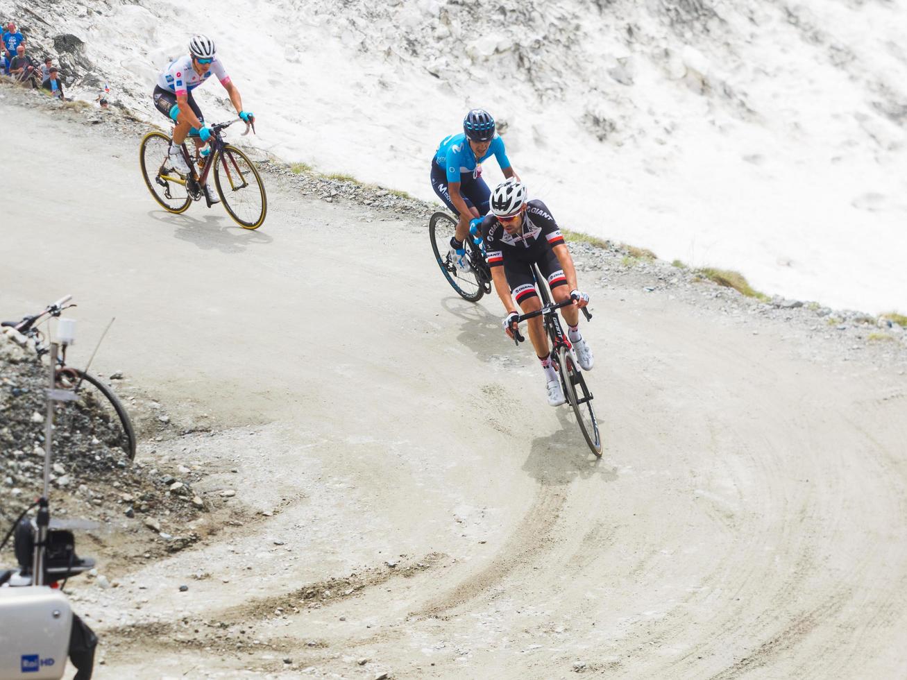 Piedmont, italy 2018- Cyclists ride uphill during the international cycling race Giro D'Italia photo