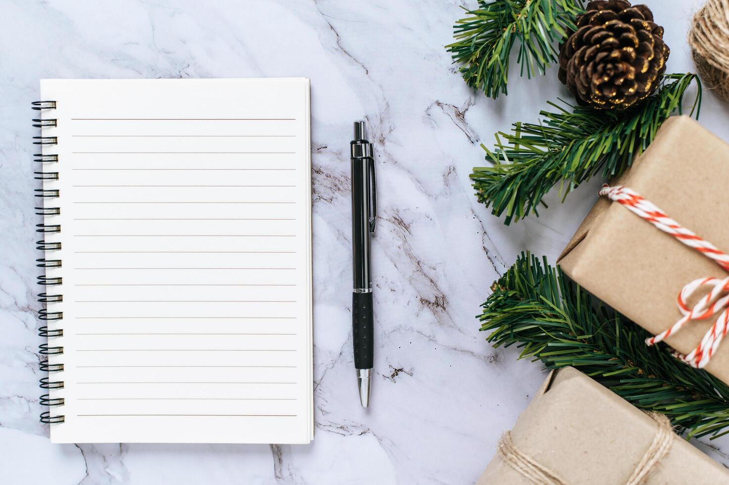 A notebook placed on a cement background with giftshop photo