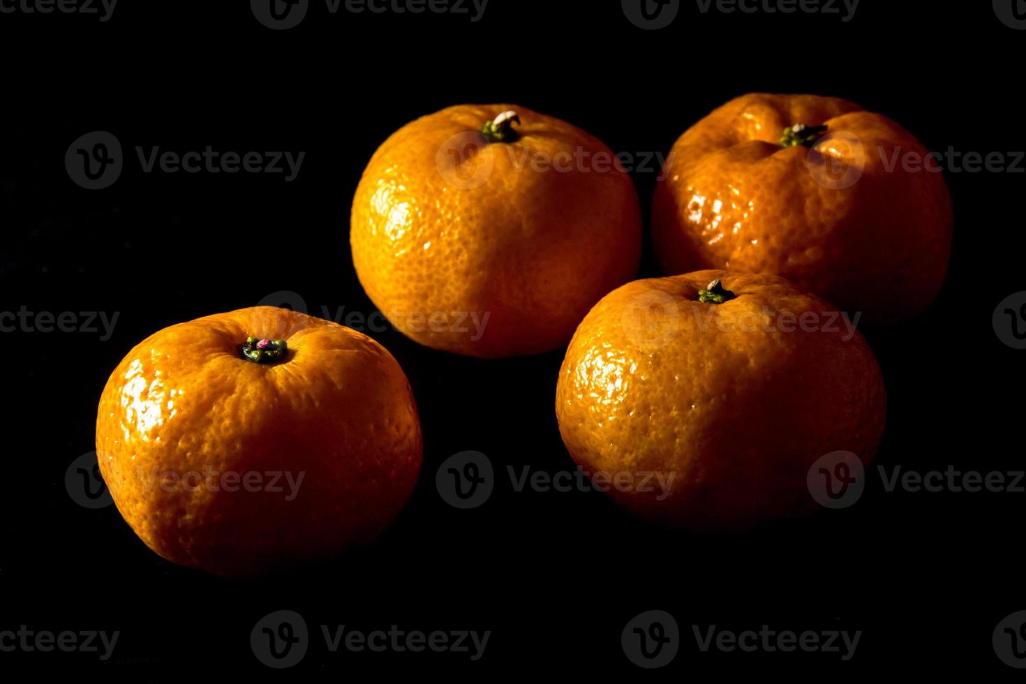 Glossy surface texture of freshness orange fruits photo