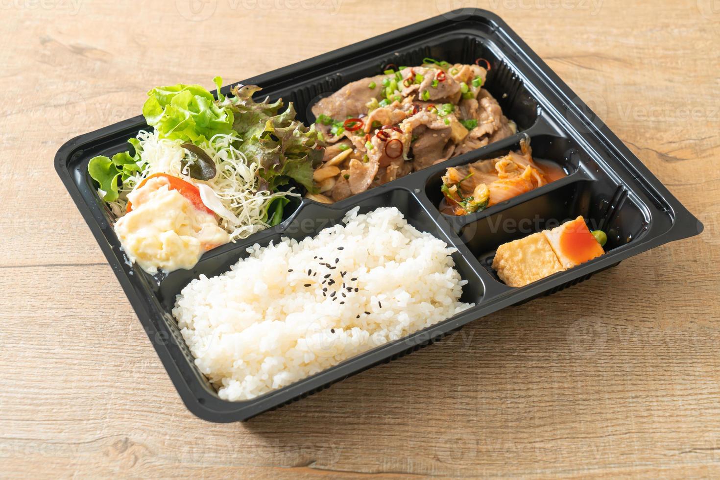 Japanese rice with pork yaki bento set photo