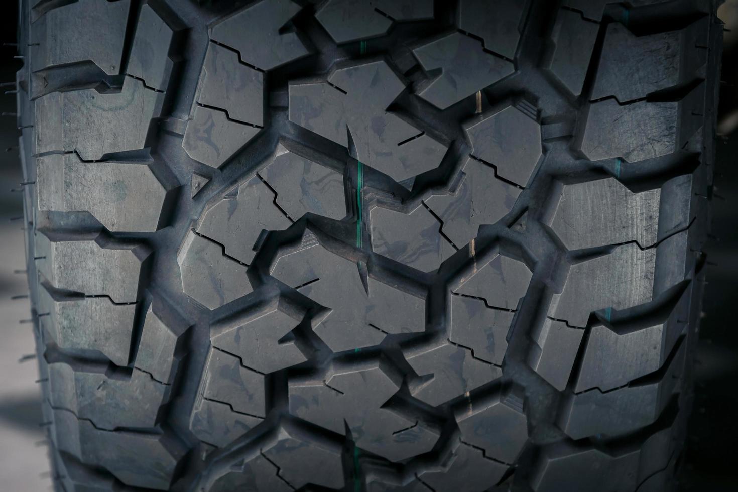 Close-up of all terrain tire patterns and textures. photo