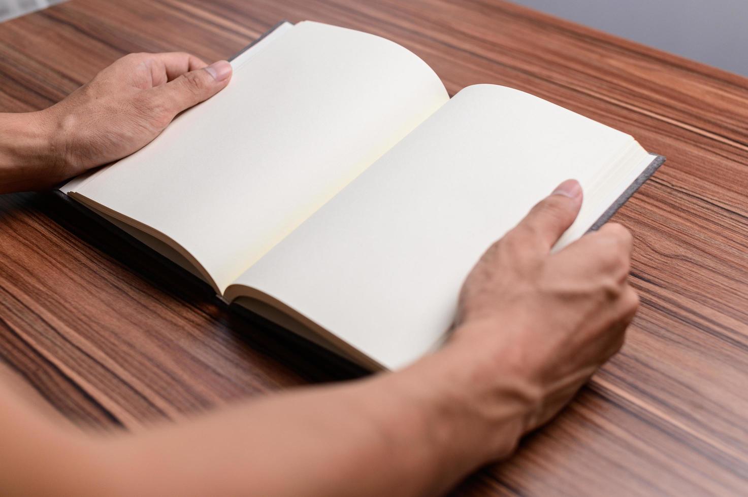 The book is at the desk. photo