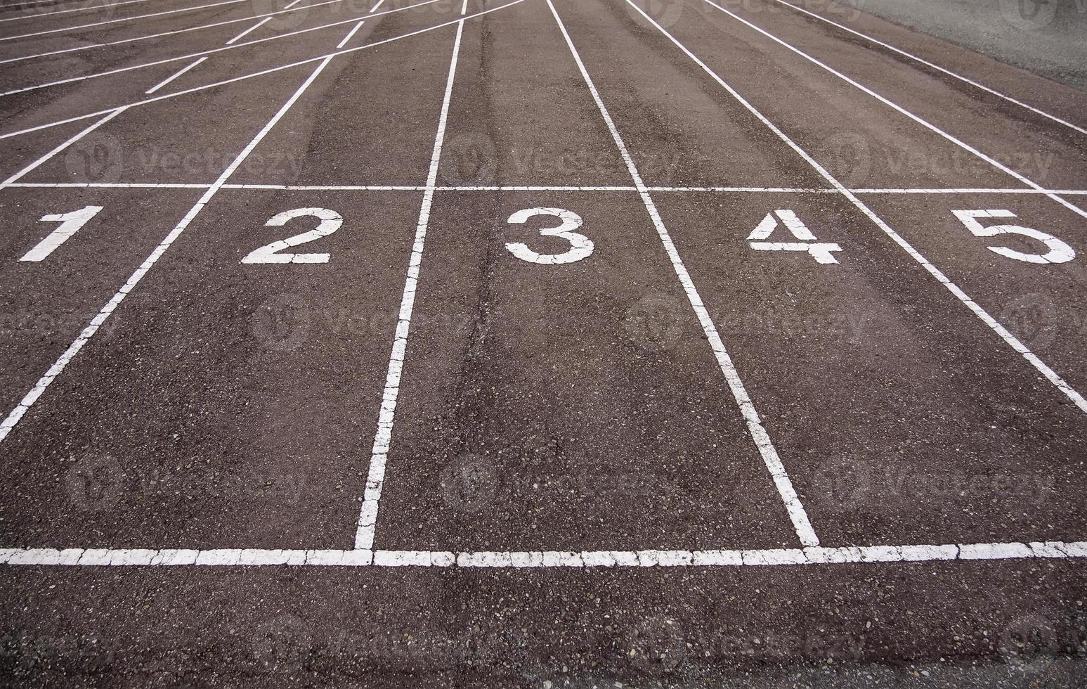 Numbers on a running track photo