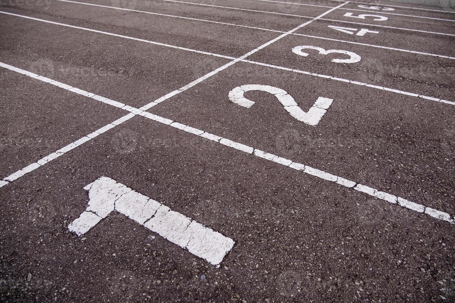 Numbers on a running track photo
