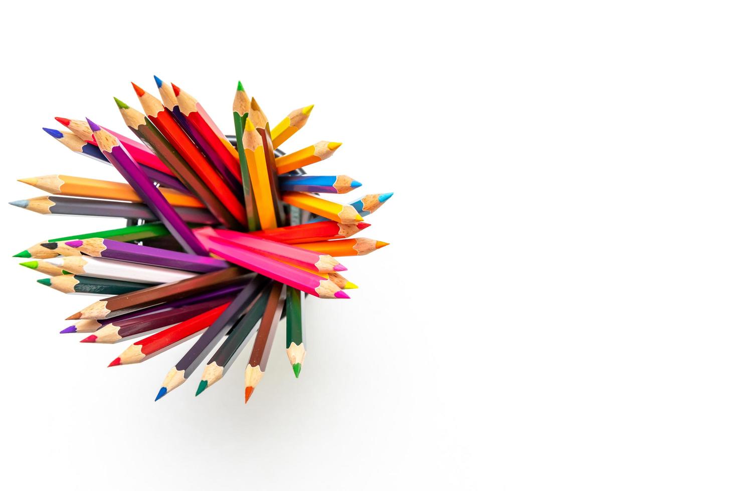 Colour pencils on white background close up photo