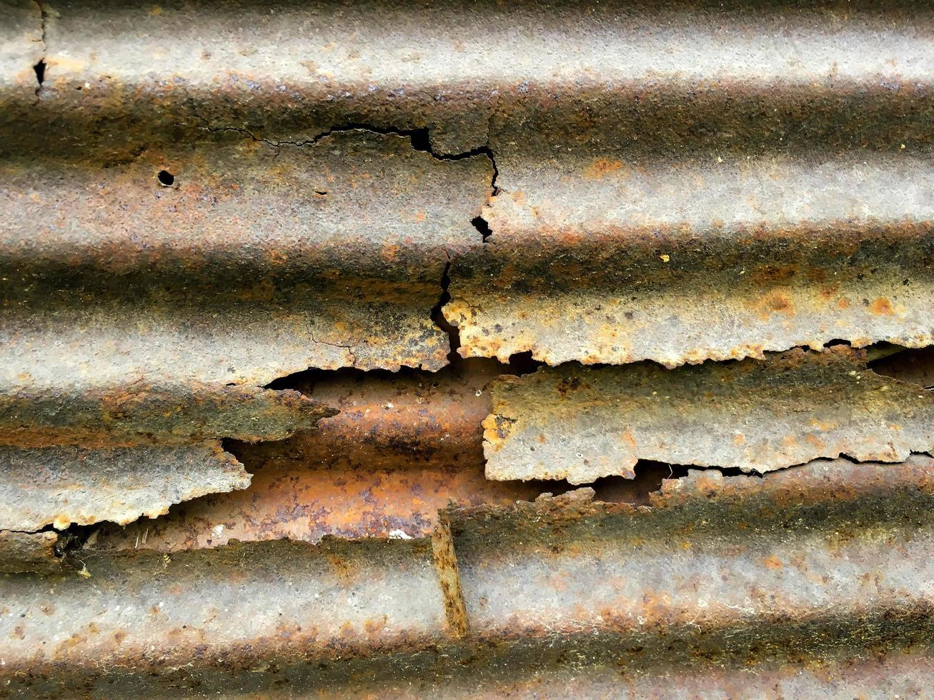 Background and wallpaper of zinc, Rust paint pattern on zinc. photo