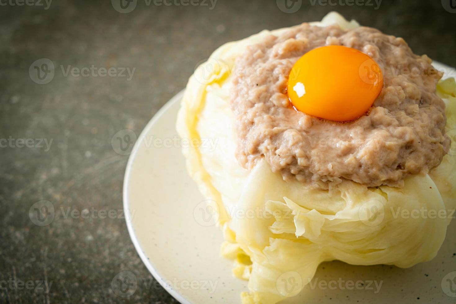 Steamed cabbage stuffed minced pork and egg yolk photo