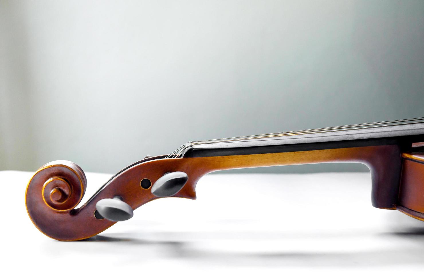 The violin on the table, Close up of violin on the wooden floo photo