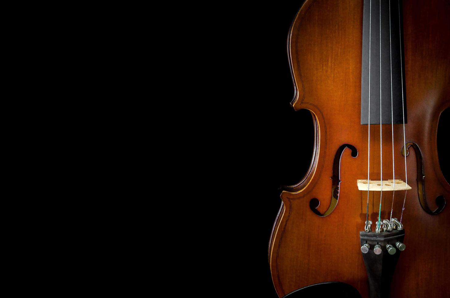 The violin on the table, Close up of violin on the wooden floo photo