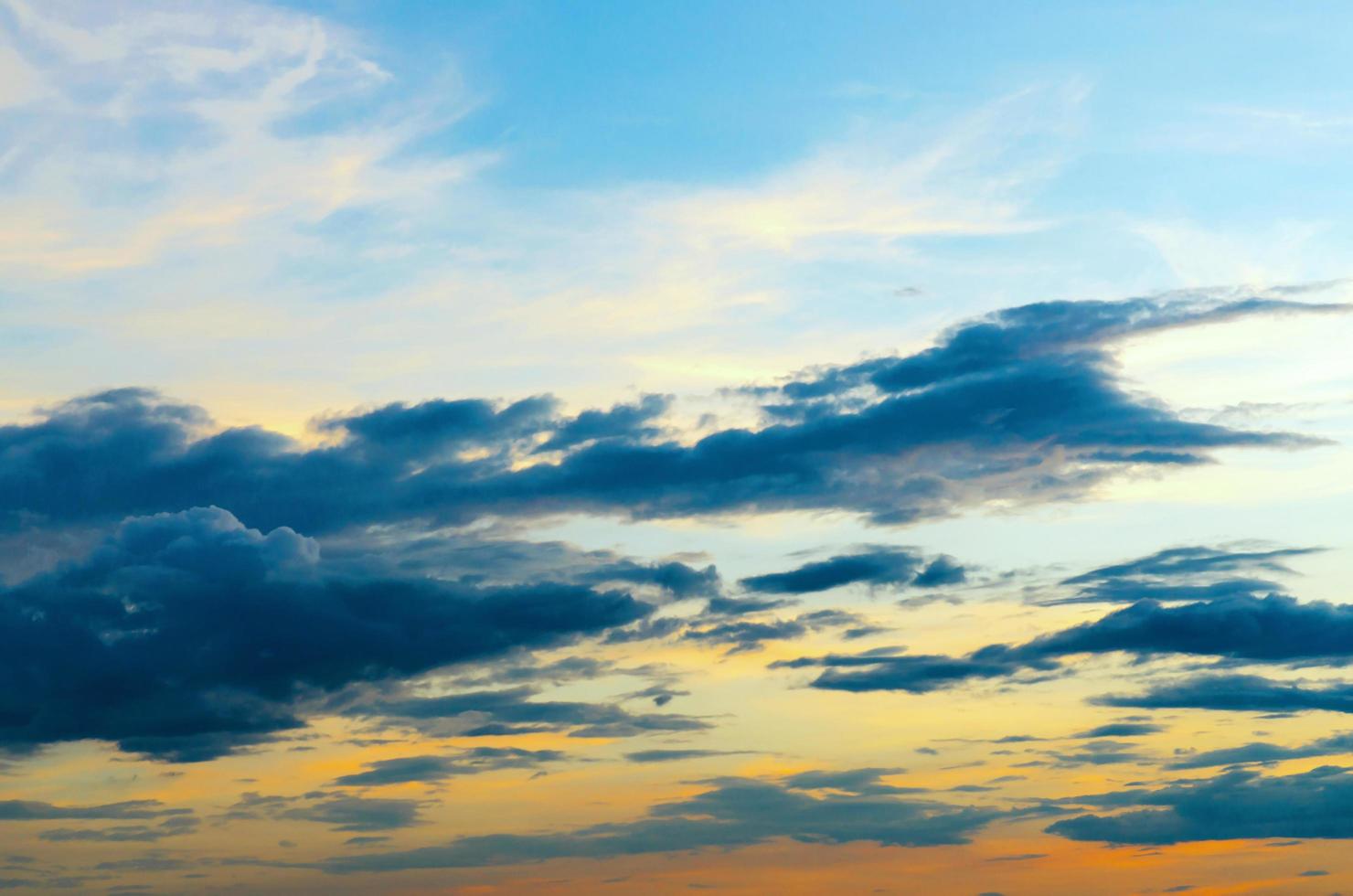 Dark clouds and dark sky in rainy day, Cloudy and stormy and blue sky photo