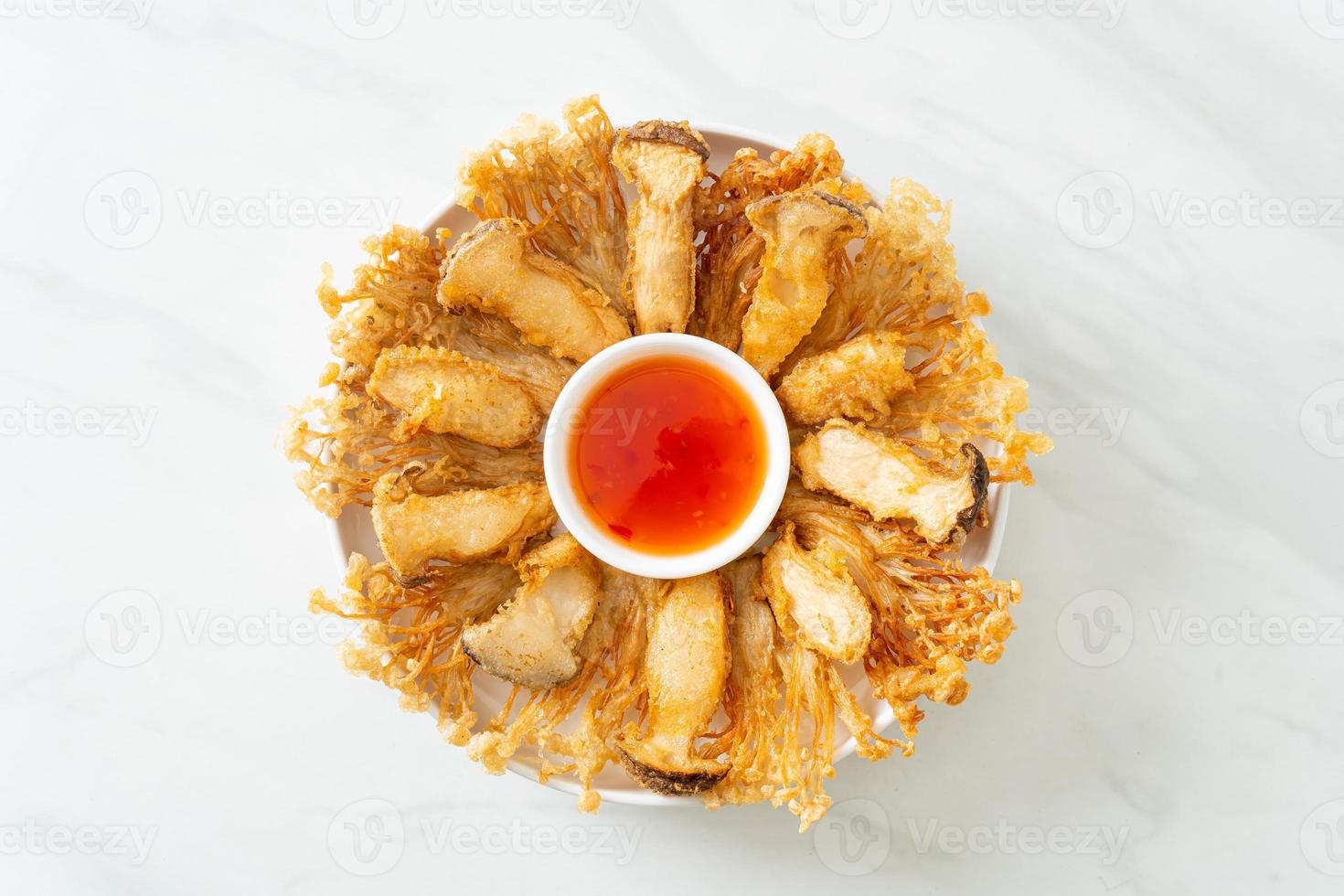 Deep fried enoki mushroom with spicy dipping sauce photo