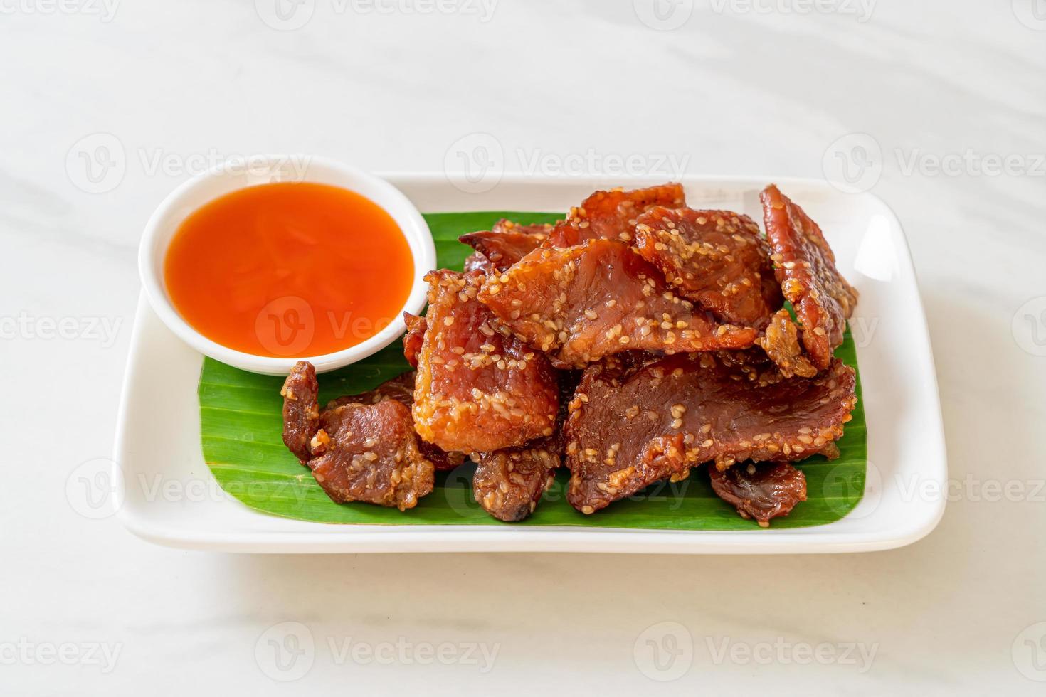 Sun dried pork with sauce photo