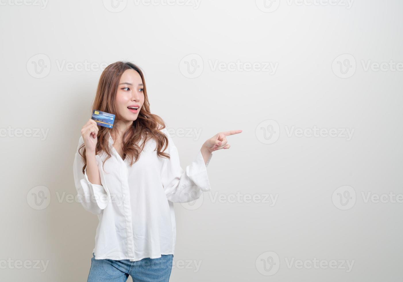 Portrait beautiful Asian woman holding credit card photo
