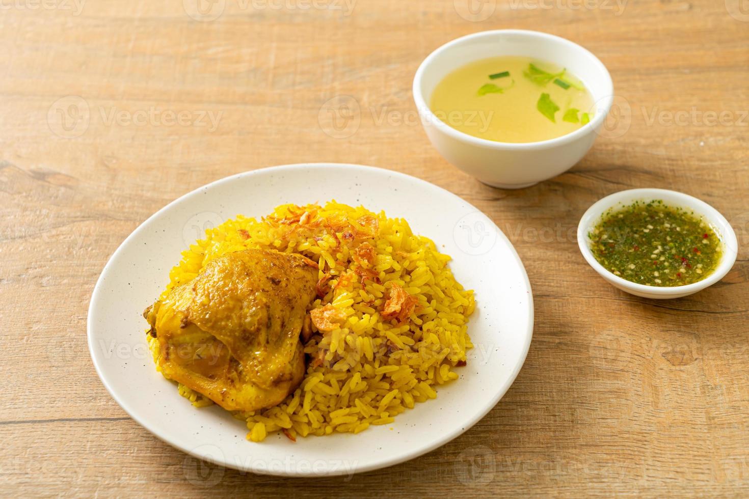 Chicken biryani or curried rice and chicken photo