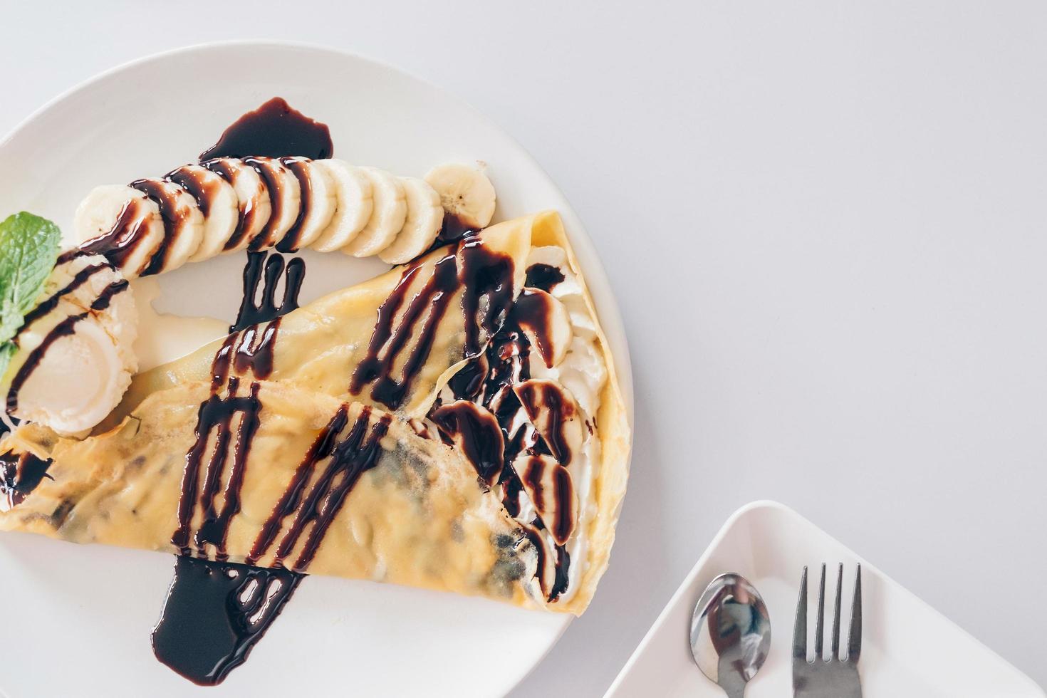 Bingsu mango and Shaved ice desserts, Chocolate crepe and vanilla. photo