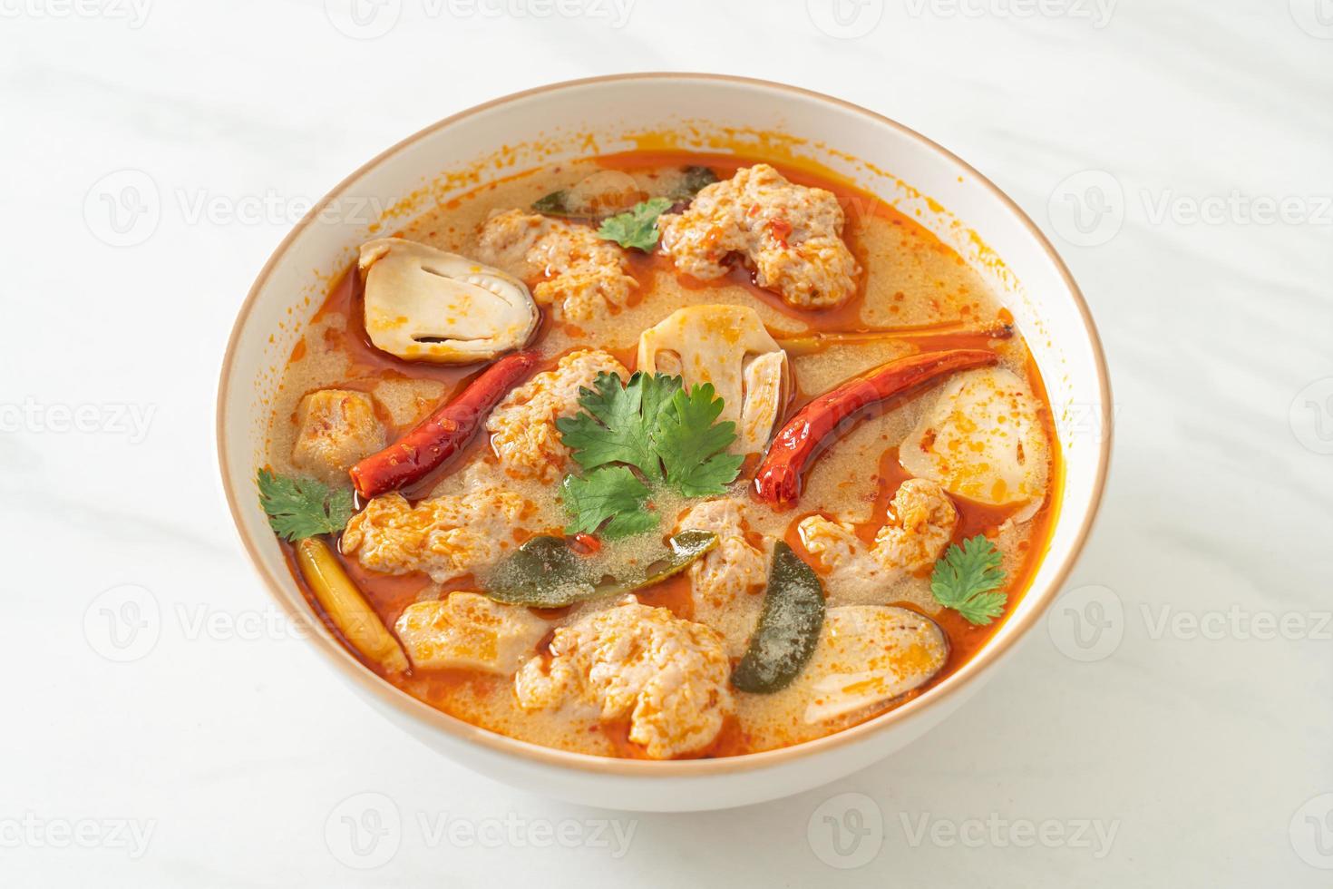 Spicy boiled pork soup with mushroom - Tom Yum photo