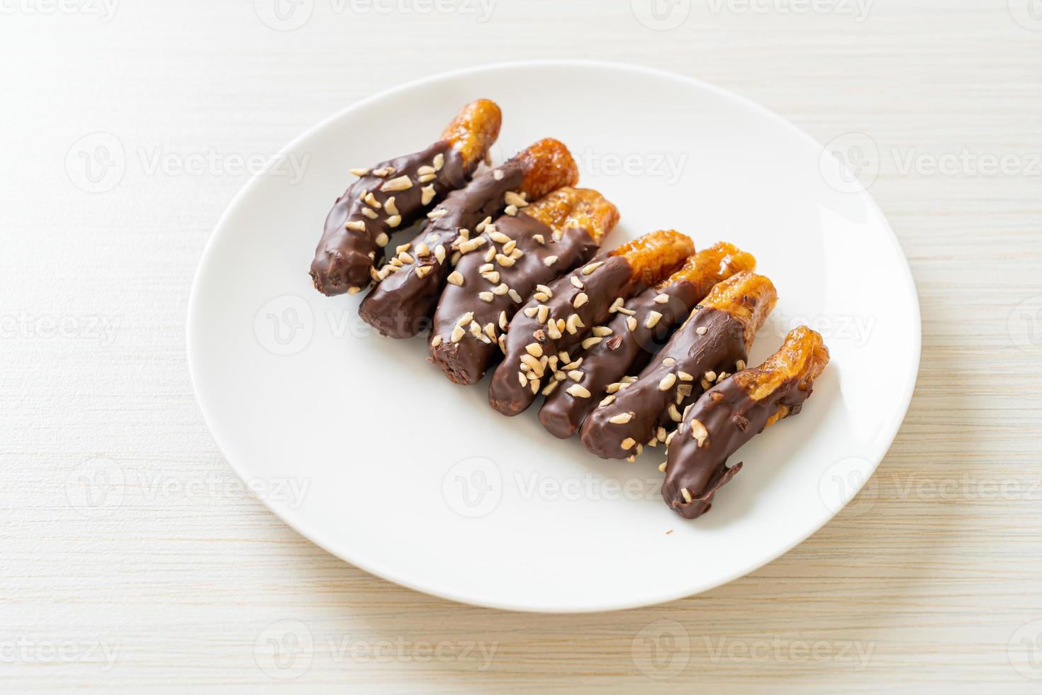 Banana chocolate coating or banana dipped chocolate photo