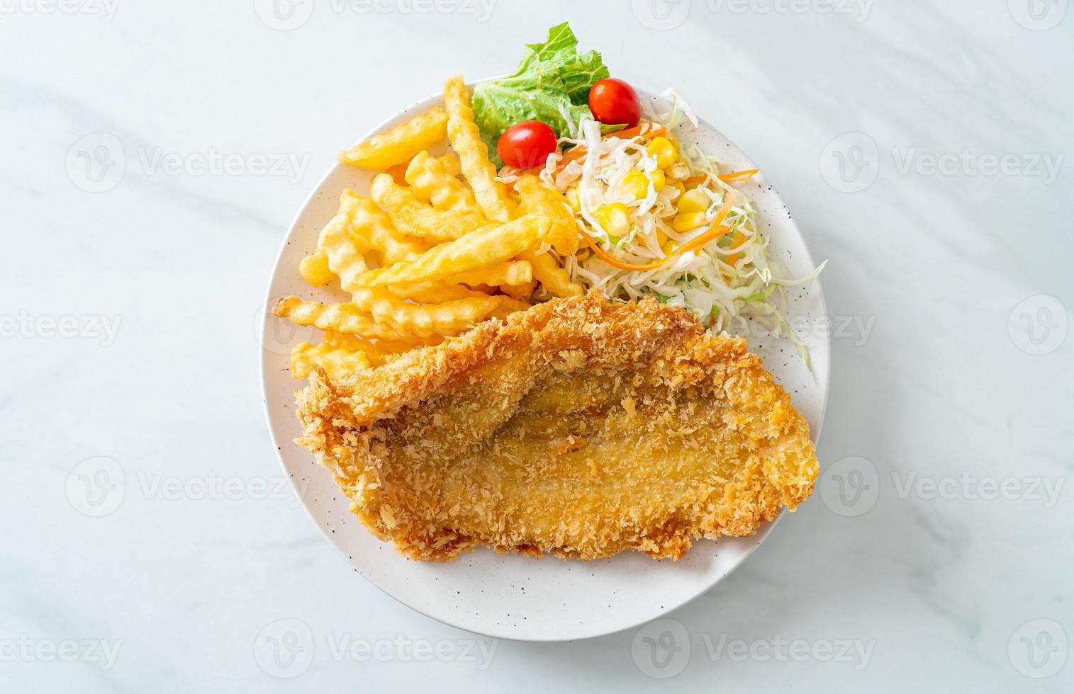 Fried fish and potatoes chips photo