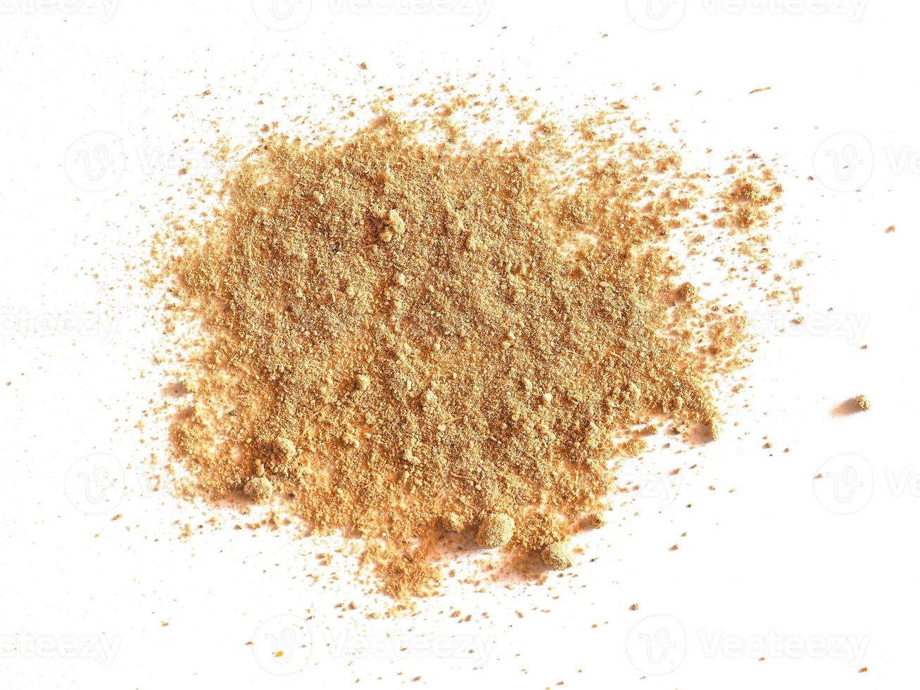 Ginger Zingiber officinale powder over white photo
