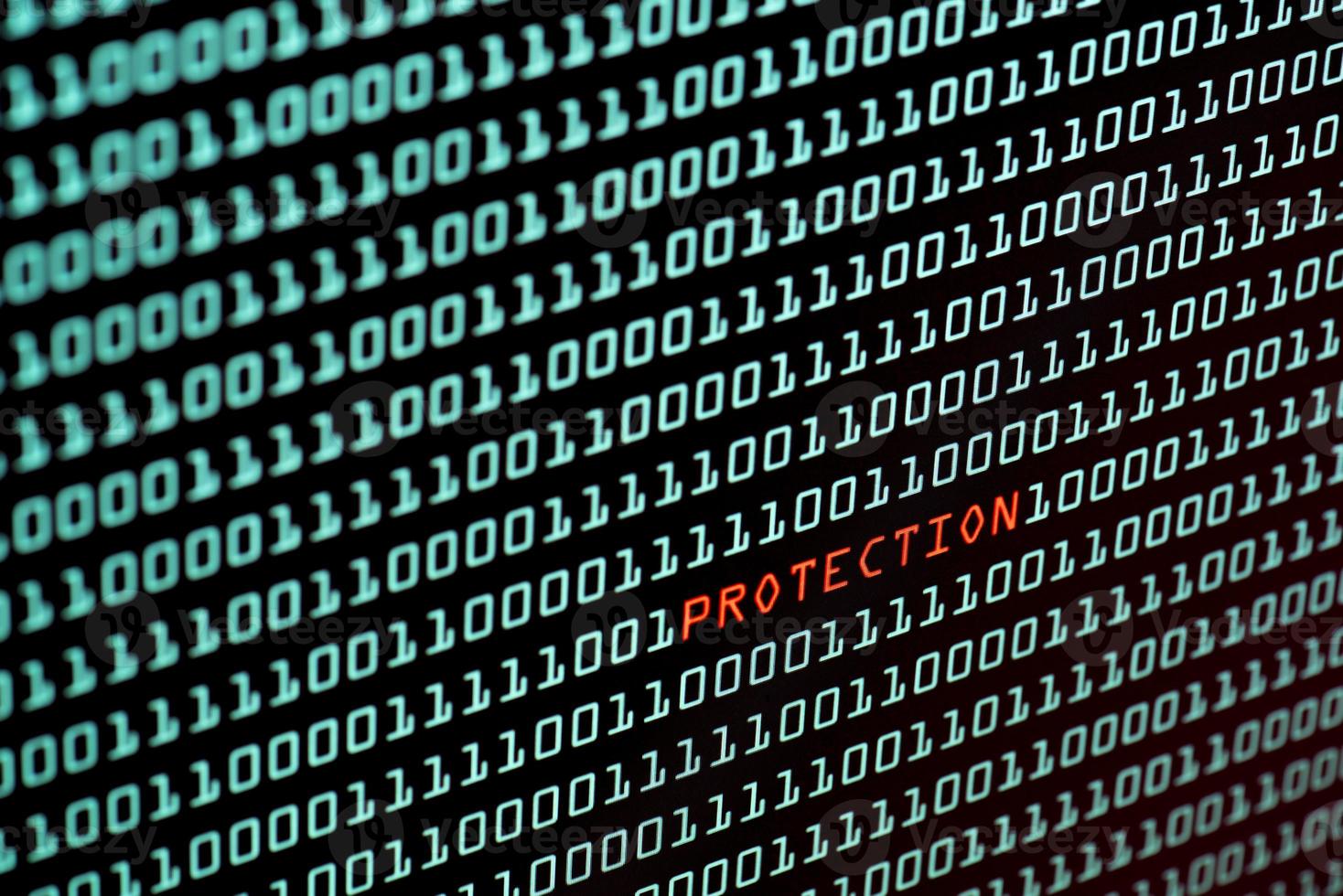 Protection text and binary code concept from the desktop screen photo