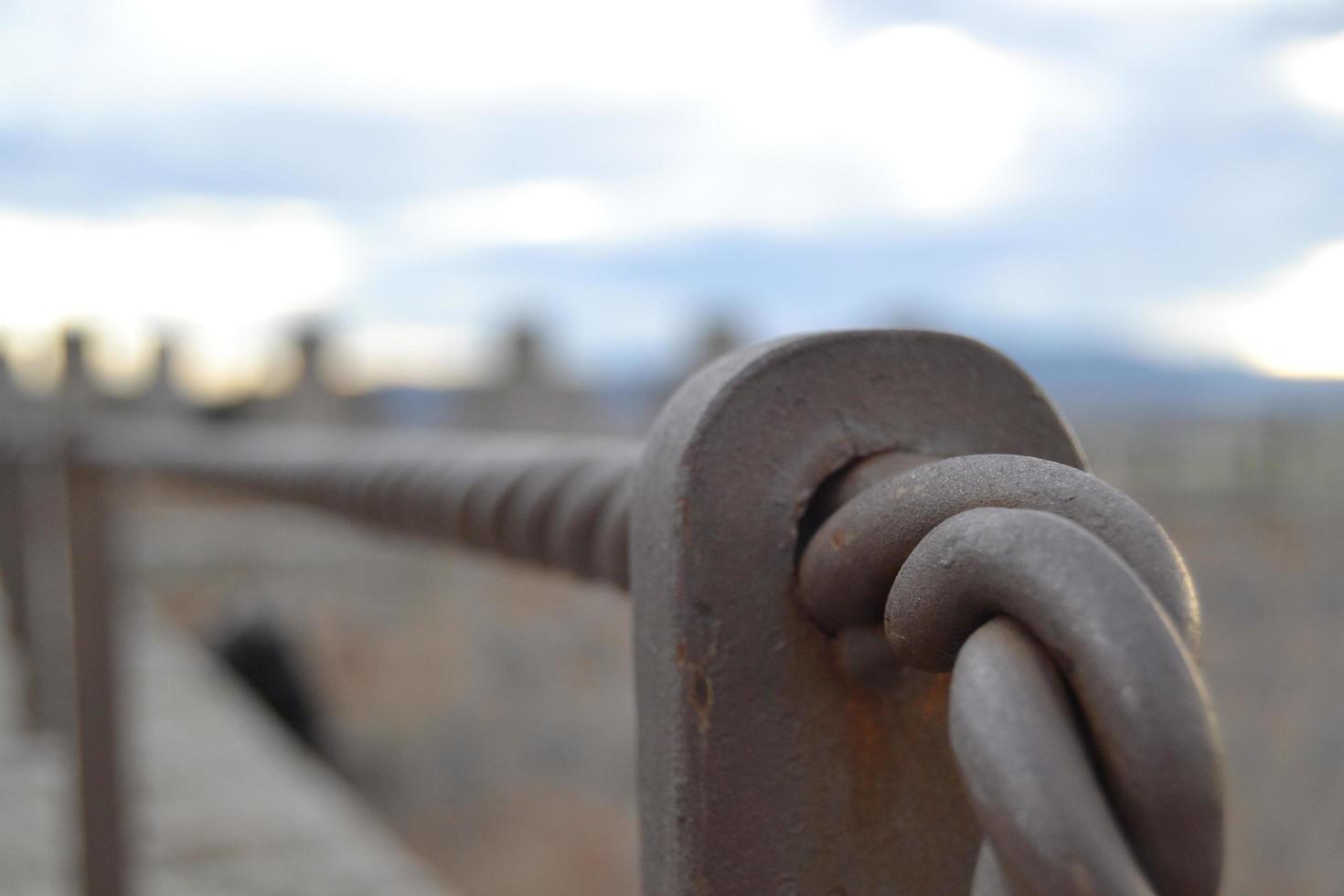Piece of handrail of a staircase with direction to infinity photo