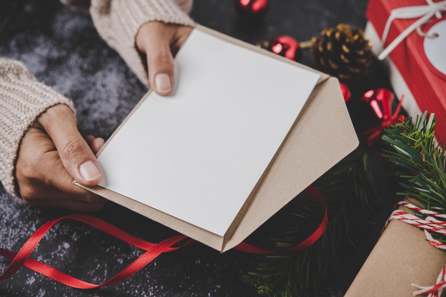 Hands holding opened notebook photo