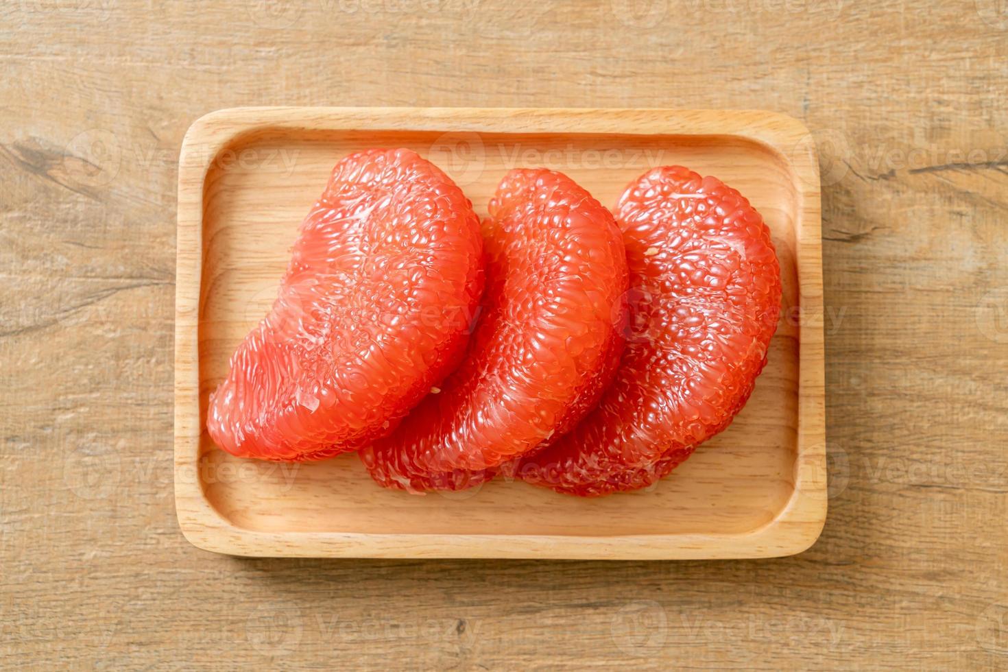 Fresh red pomelo fruit or grapefruit photo