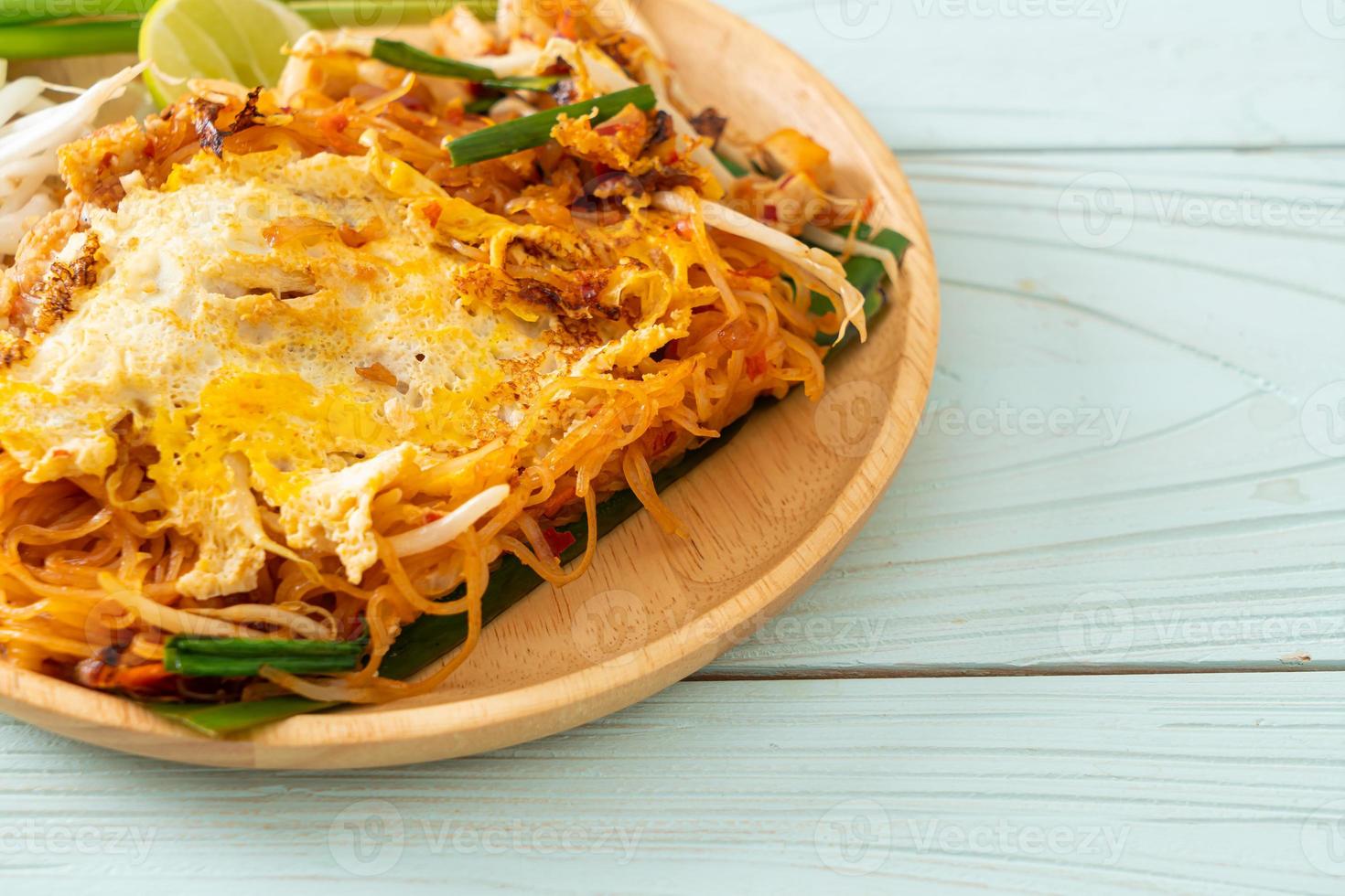 Pad Thai - stir fried noodles in Thai style with egg photo