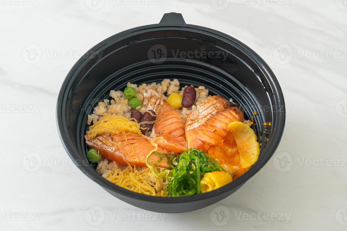 Grilled salmon with brown rice donburi photo