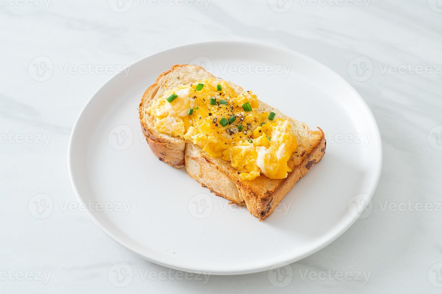 Bread toast with scramble egg and bacon photo