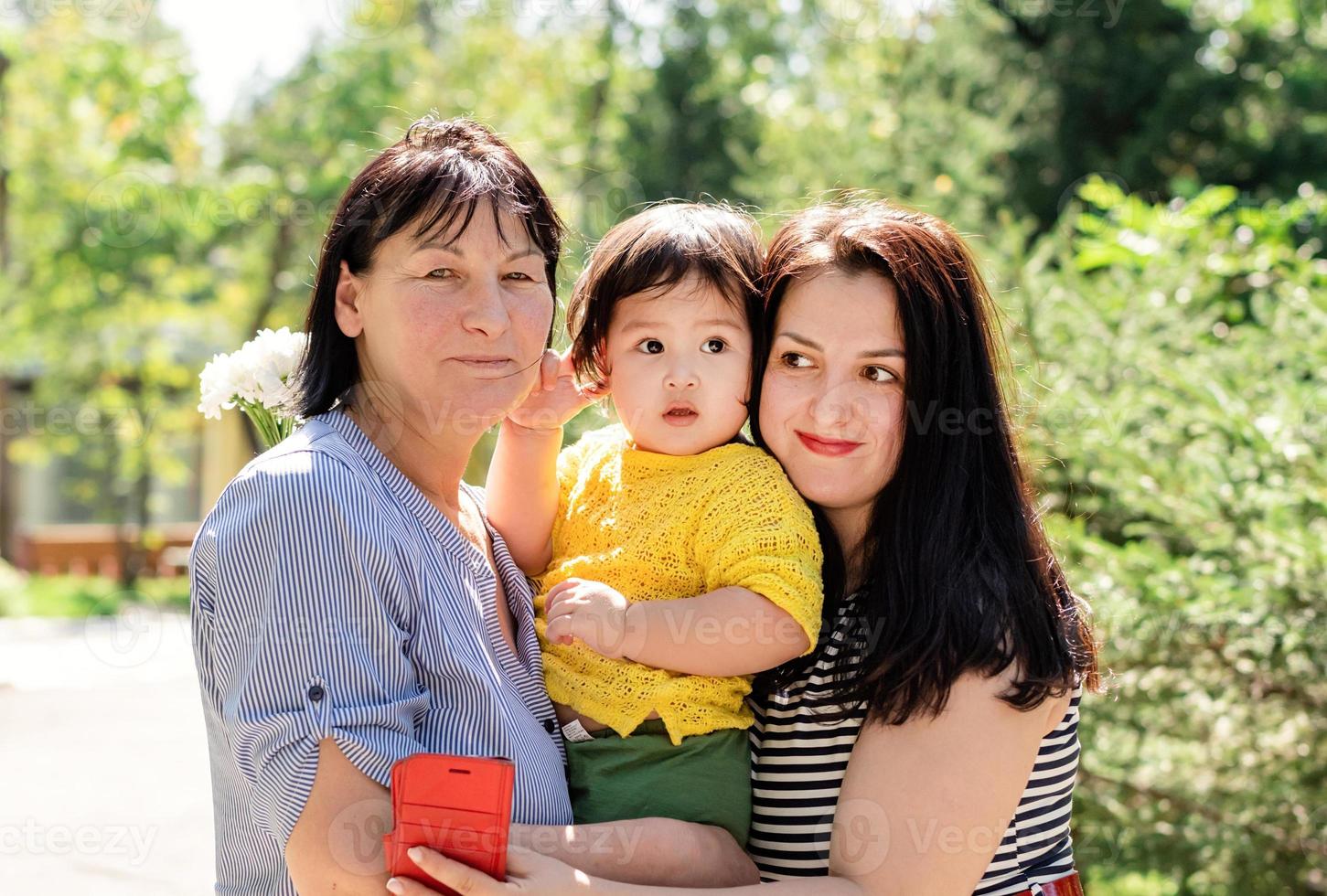 Multi generation portrait of grandma with daughter and granddaughter photo