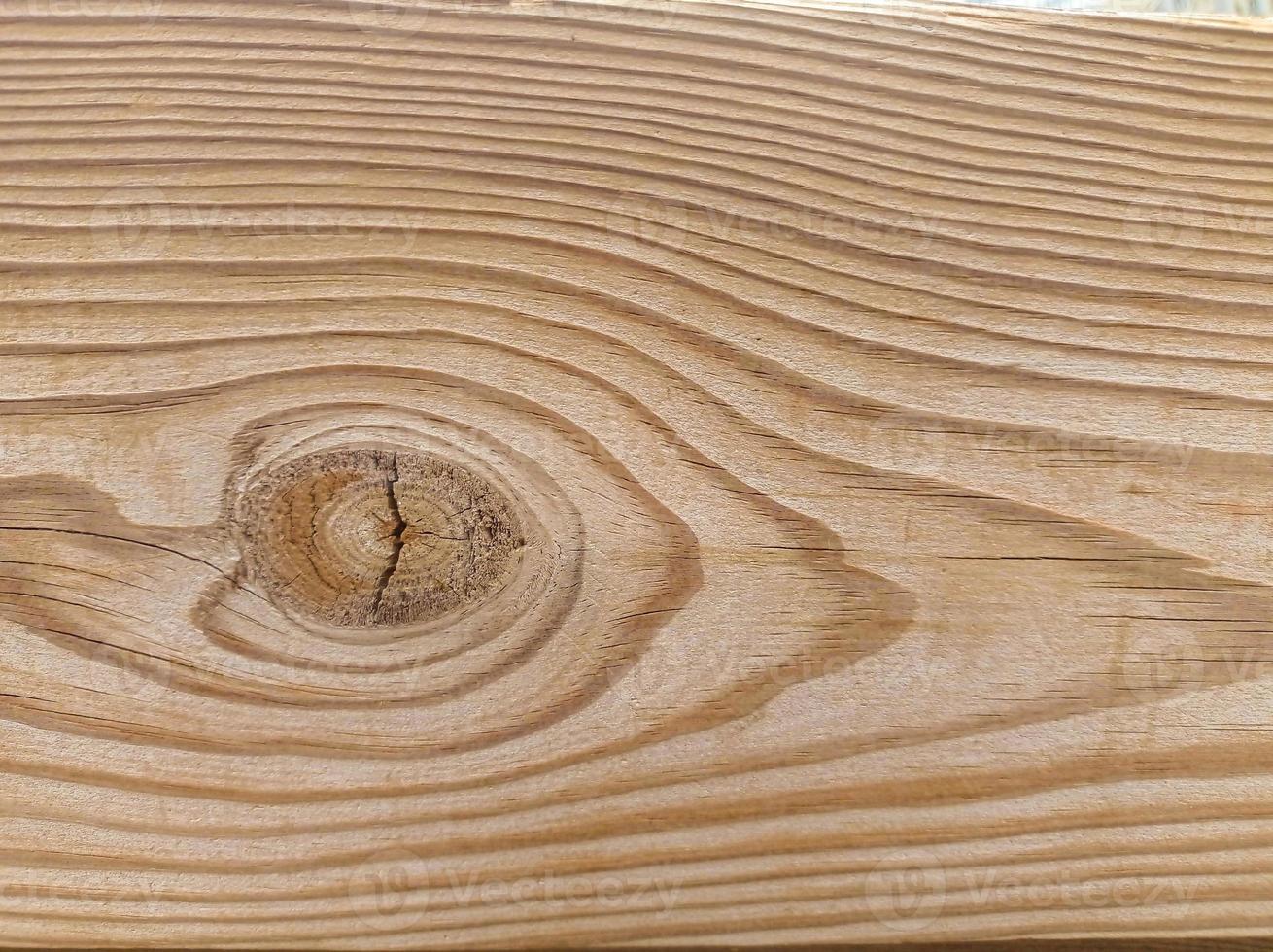 The texture of a brown wooden board photo